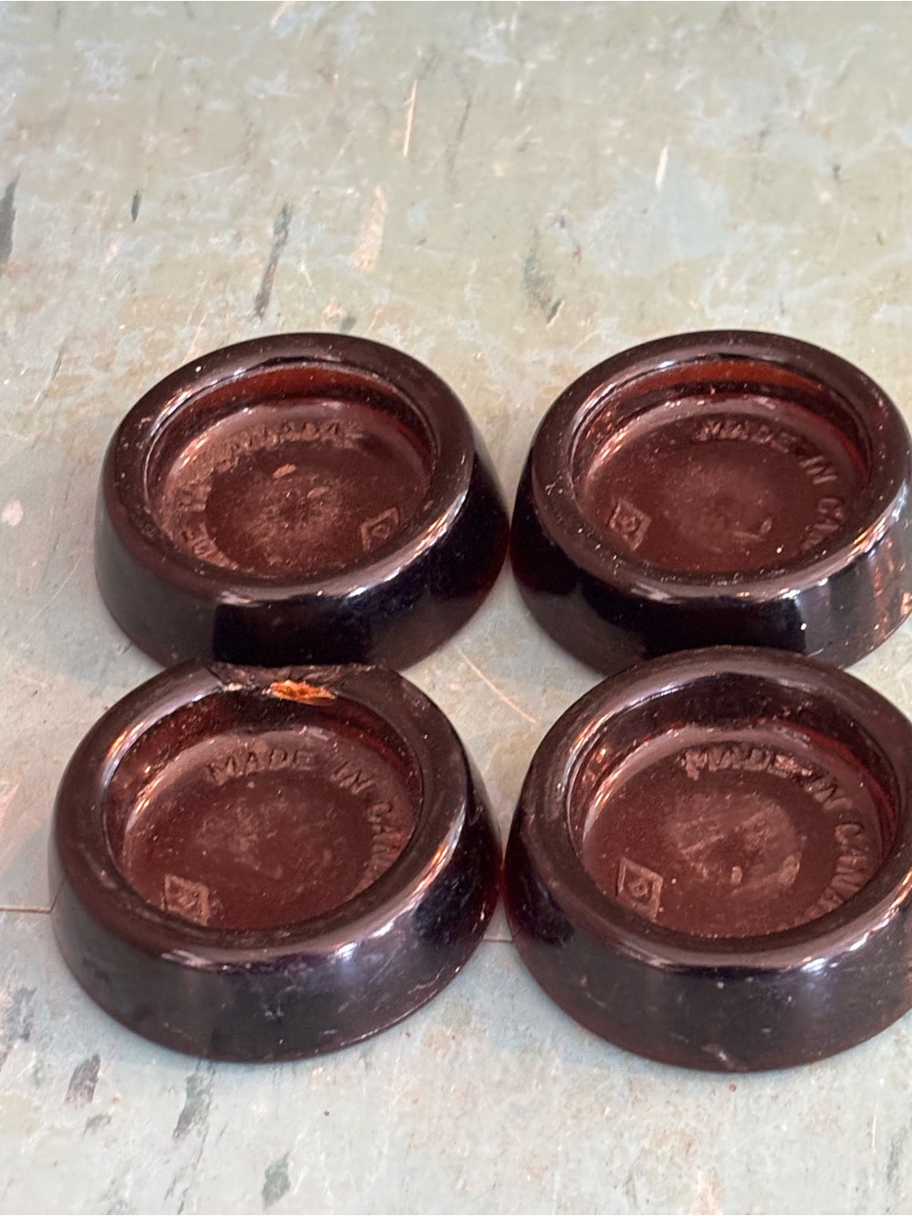 Set 4 vintage brown glass furniture coasters sliders